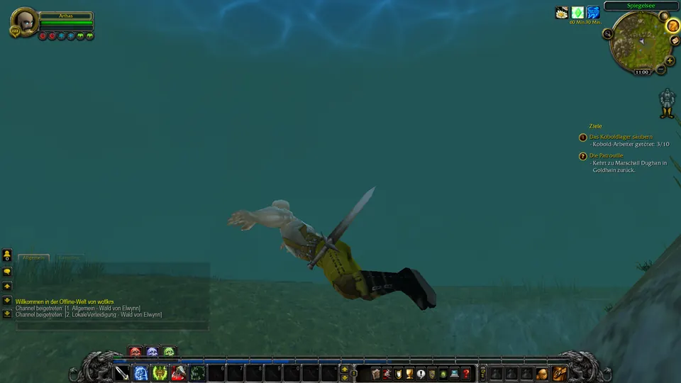 Die Figur schwimmt unter Wasser zur Oberfläche