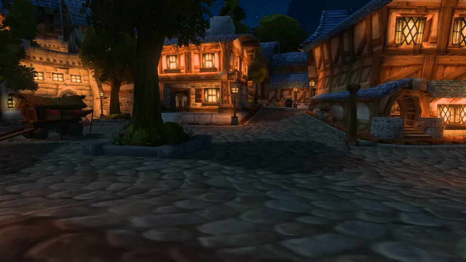 Mitternacht in Sturmwind, nur Fenster und Laternen erhellen den dunklen Platz.